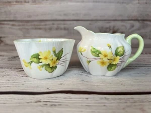 MINI CREMA Y AZUCARERO Shelley INGLATERRA PRÍMULA DELICADA Bone China De colección - Imagen 1 de 9