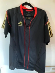CAMISETA: ADIDAS PROFESIONAL CLIMA FRESCO TALLA PEQUEÑA NEGRA DORADA ROJA - Imagen 1 de 10