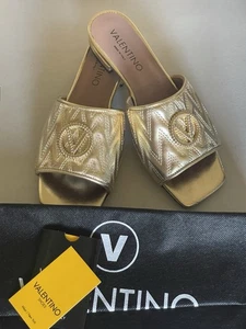 VALENTINO AFRODITE LOGO QUILTED LEATHER SLIP-ON SANDALS IN GOLD 8 - Picture 1 of 11