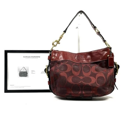 Cartera Hobo Coach E0868-12657 Zoe Borgoña Firma Jacquard Cuero Bordeado con Certificado de Autenticidad Foto 1 de 4