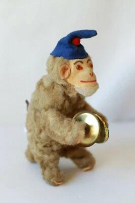 Jouet singe ancien articulé en peluche - Photo 1/4