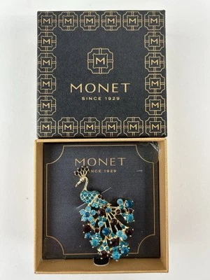 Broche prendedor Monet tono dorado pavo real con pedrería púrpura y aguamarina profunda NUEVO Foto 1 de 3