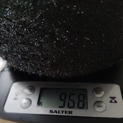 Black sparkling yarn on cone. 900gr.. Good for adding to your own yarn mix. - Image 1 of 4