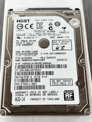 HGST HTS541010A9E680 p/n: 0J34283 mlc: DA5972 1TB SATA 2.5" Hard Drive NT* - Image 1 of 2