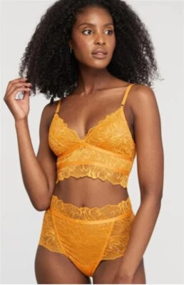 Nuevo con etiquetas Conjunto de sujetador y braguita Fleur'T de encaje amarillo Longline 119092 Foto 1 de 3
