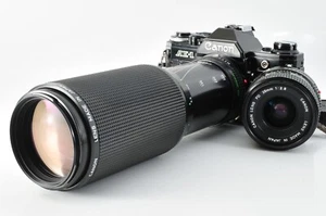 Canon AE-1 fotocamera pellicola 35 mm NUOVA FD 28 mm f2.8 +100-300 mm f5.6 dal GIAPPONE 【Ecc+4】 - Foto 1 di 15