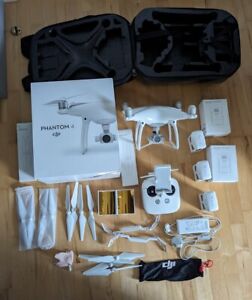 DJI Phantom 4 Drone With 3 New Batteries, 12 Blades + Extras + New Controller