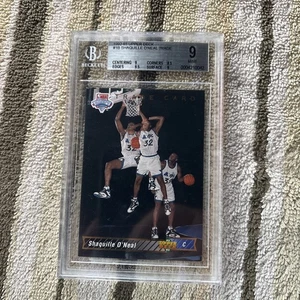 1992 UPPER DECK 🏀SHAQUILLE O'NEAL #1B PSA 9💰LOW POP!*GEHANDELT*(R/C)👈HOF SELTEN!! - Bild 1 von 3