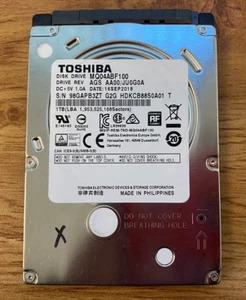 TOSHIBA 1TB 2.5" SATA HARD DRIVE MQ04ABF100 AGS AA00/JU0G0 J5J36541L *AS IS* - Picture 1 of 5