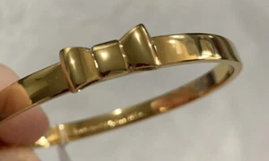 BRAND NEW 2014 WITH TAG KATE SPADE TAKE A BOW GOLD TONE METAL BANGLE BRACELET - Picture 1 of 21