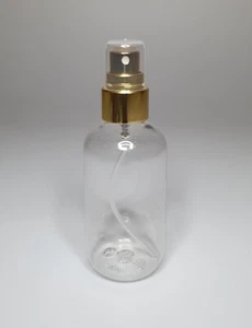Quality 100ml PET Plastic Clear Boston Bottle & Gold Atomiser Spray ANY AMOUNT - Picture 1 of 1
