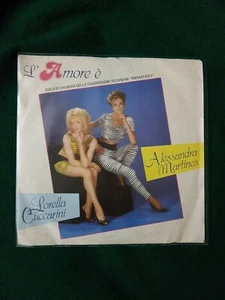 L'amore É Lorella Cuccarini Alessandra Martinez 45 giri 7" 1986 prima ed. - Foto 1 di 4