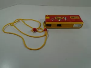 CARAMELLE AL CIOCCOLATO M & M ANNI '80--FOTOCAMERA SORRISO TASCABILE (LOOK) - Foto 1 di 6