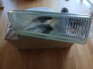 Datsun Bluebird 910, LH Scheinwerfereinheit, Neu im Karton Originalteil. - Bild 1 von 3