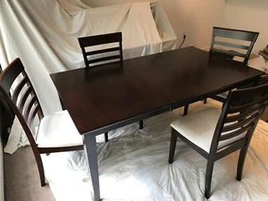 Dining table and 4 chairs. Dark wood dinner table with white suede seat cushions - Picture 1 of 12
