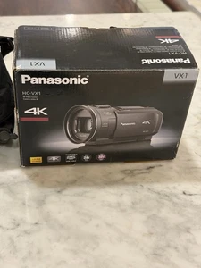 Videocámara Panasonic HC-VX1, cámara de video digital 4k negra con trípode en caja - Imagen 1 de 21