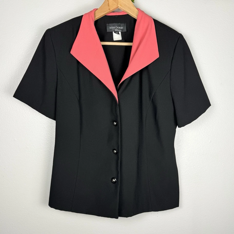 Blusa Miss Dorby Negra Con Cuello Coral Abotonado Manga Corta Talla 14P Foto 1 de 4