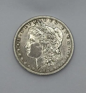 1884-O Morgan Silver Dollar about circulated 90% Siver - Picture 1 of 4
