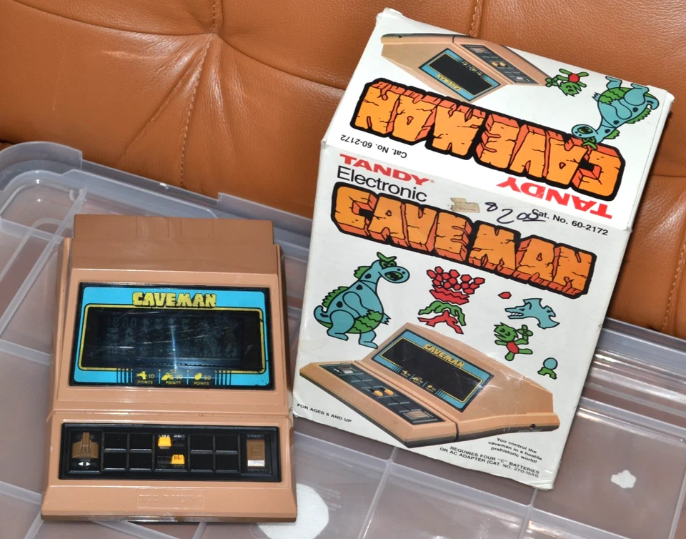 TANDY CAVEMAN Radio Shack Mesa Electrónica Portátil Variante Tomy con CAJA Foto 1 de 4