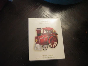 HALLMARK TOYLAND EXPRESS 2008 CHRISTMAS KEEPSAKE ORNAMENTS TRAIN TOY CAT - Picture 1 of 2