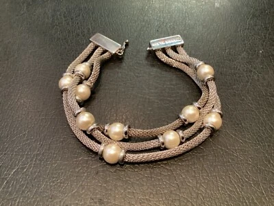 BRAZALETE AUTÉNTICO FIRMADO ANN KLEIN TRIPLE MALLA Y PERLA TONO PLATA SIN RESERVA Foto 1 de 4