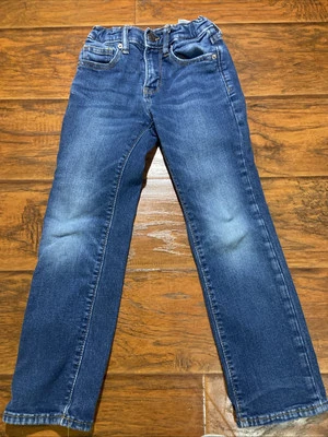 Pantalones de mezclilla flexibles incorporados descoloridos azules de pierna recta Old Navy para niños niñas Foto 1 de 4