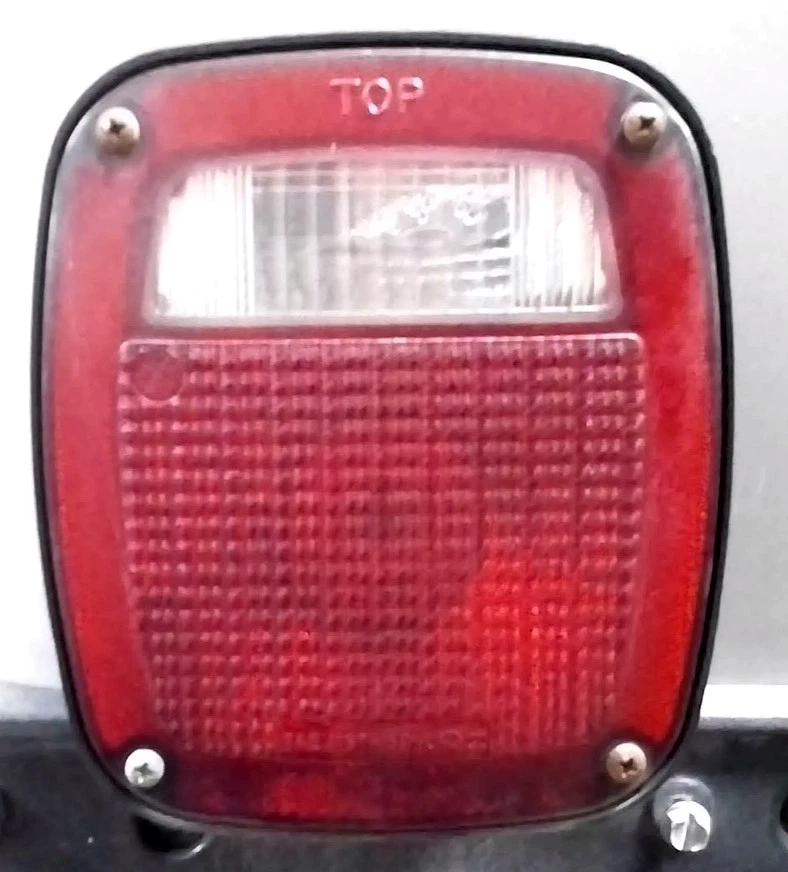 1987-2006 JEEP WRANGLER Left Driver Side Tail Light Assembly - Image 1 of 1