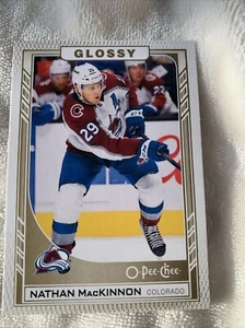 2023-24 Upper Deck Opeechee Glossy R-36 Nathan MacKinnon Gold - Picture 1 of 2