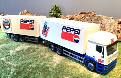 Herpa LKW Brauerei Serie Pepsi Wechselbrücke Iveco Zugmaschine 1:87 H0 - Bild 1 von 3