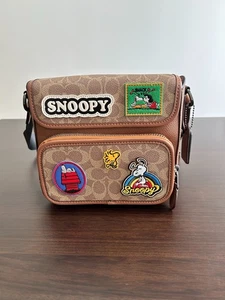 Coach x Snoopy Sullivan Umhängetasche braun Signature Canvas - NEU - Bild 1 von 5