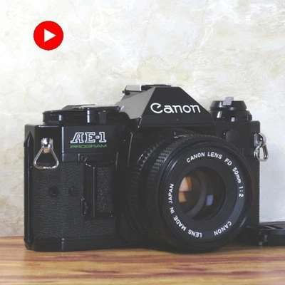 Canon AE-1 Program Film Camera [quasi come nuova/completamente funzionante]... - Immagine 1 di 4
