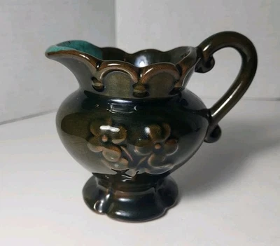 Vintage Drip Glazed Pottery Creamer Mini Pitcher Brown Green Embossed Flowers - Image 1 of 4