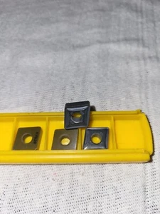 Kennametal Kenloc Keramikeinsätze CNGA433 Grade KY2100 Stck. 4 Stück #1182040 - Bild 1 von 4