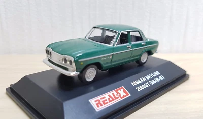 1/72 Real-X NISSAN SKYLINE 2000 GT VERDE modelo de coche fundido a presión Foto 1 de 3