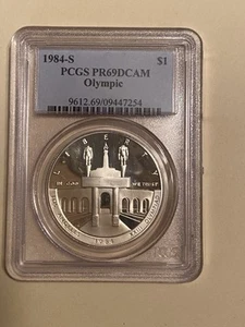 1984-S $1 OLYMPIC PROOF SILVER DOLLAR (XXIII OLYMPIAD) PCGS PR69 DCAM - Picture 1 of 2