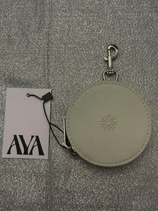 AYA AS YOU ARE Coin Purse Round Zip Bag Clip On Hook Beige Neutral NWT Vegan - Picture 1 of 5