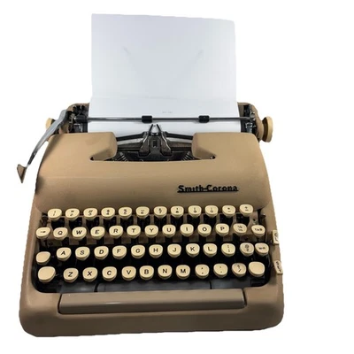 Máquina de escribir Smith Corona Silent Super bronceada vintage años 50 con estuche Foto 1 de 4