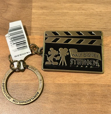 Walt Disney Studios Disneyland Paris That's A Wrap! Metal Keyring Bag Charm- New - Image 1 of 4