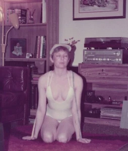 1980s Sexy Pretty Woman Swimsuit Kneeling Indoors Candid Home Snapshot - Picture 1 of 3