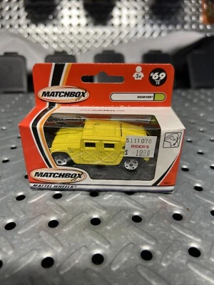 2000 Matchbox MB69 HUMVEE Yellow - NIP TH LOGO - Image 1 of 4