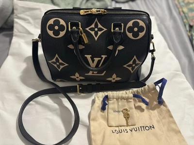 Bolso de Mano Louis Vuitton Monograma Empreinte Speedy Bandolera 25 Bicolor M58947 SA Foto 1 de 4