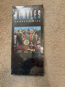 Beatles SGT 1987 CD PIMIENTOS PRECINTADO EN CAJA LARGA SIN ABRIR - Imagen 1 de 3