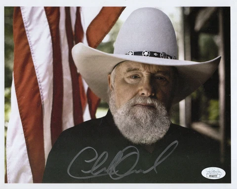 CHARLIE DANIELS HAND SIGNED 8x10 COLOR PHOTO     GREAT POSE WITH US FLAG     JSA Cover