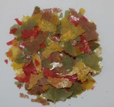 Hauptfutter Flocken 1000ml Fischfutter 4 farbig Zierfischfutter Alleinfutter - Bild 1 von 4