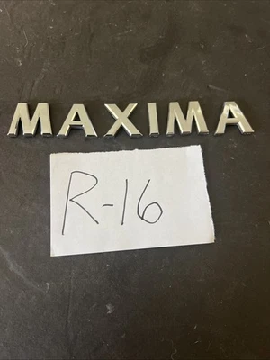 2002 2003 02 03 Nissan Máxima tapa trasera emblema logotipo insignia símbolo fabricante original usado Foto 1 de 4