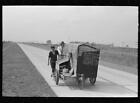 Traveling Evangelists Pushing Cart On Road Between Lafayette,Scott,Louisiana,1