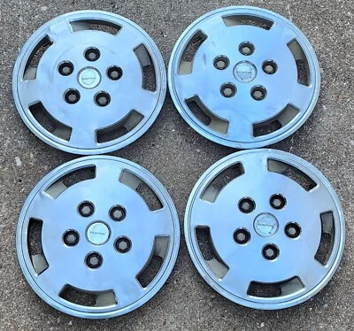 Juego de 4 Tapacubos Tapacubos OEM 1984-1989 Pontiac J2000 Sunbird Phoenix 13" Cubiertas de Rueda Foto 1 de 4