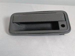 Manija de puerta exterior izquierda sin marca, negra, metálica, excepto el sello, caja abierta nueva - Imagen 1 de 8