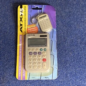 ATX75 Solar Handheld Calculator W/ Bonus Calculator- Sealed Never Opened - Picture 1 of 3