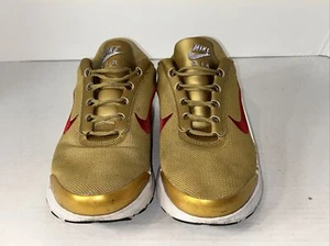 NIKE AIR MAX JEWELL QS METALLIC GOLD-VARSITY RED SZ.9 (910313-700) - Picture 1 of 6